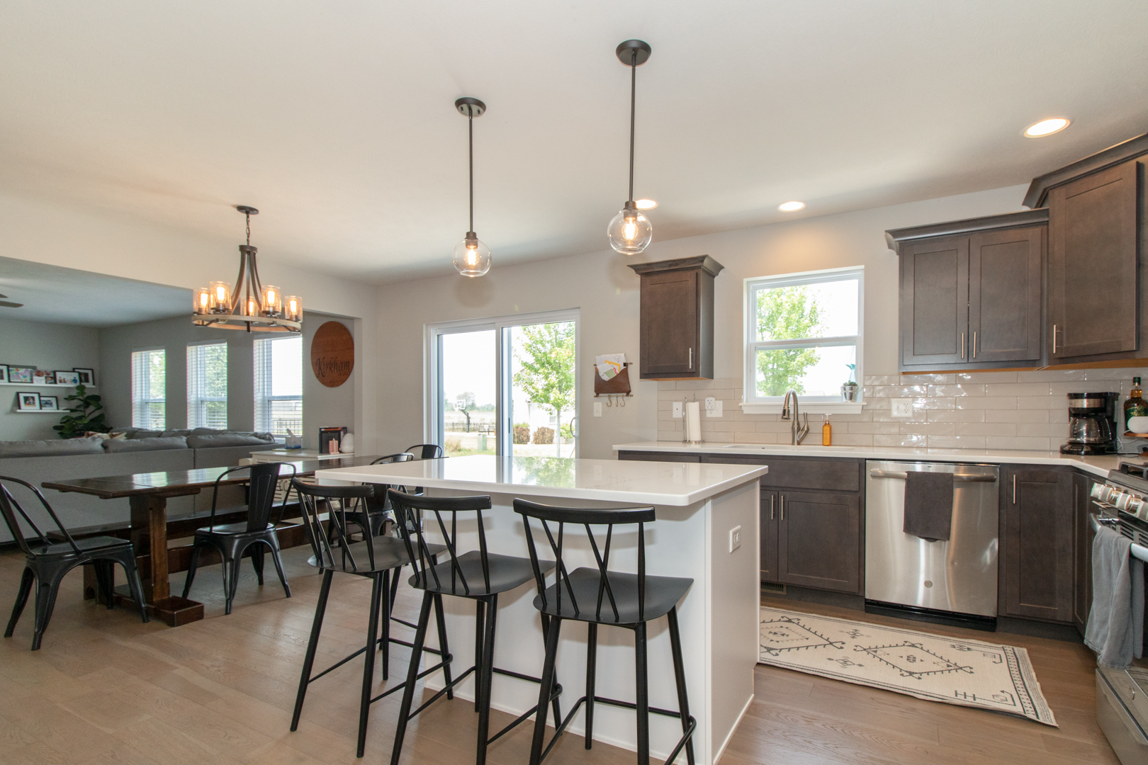 1767 Beech Street Normal, IL 61761 - Photo 19 of 55 a large kitchen with a table and chairs