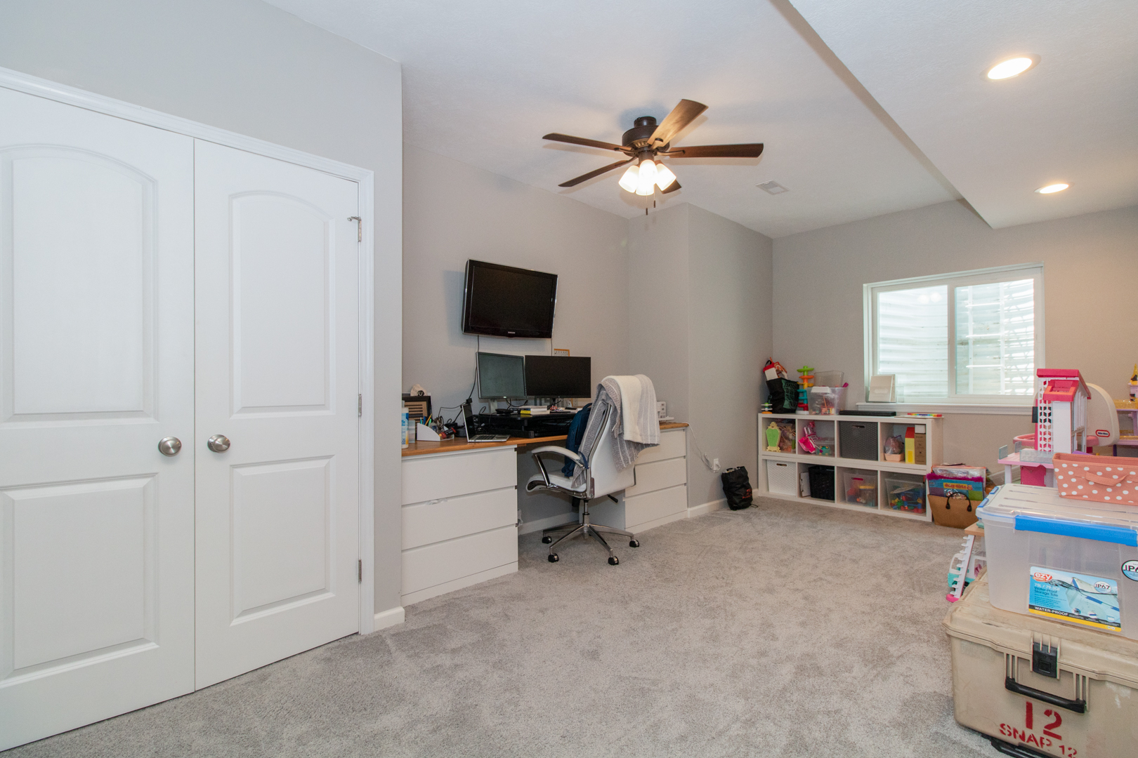 1767 Beech Street Normal, IL 61761 - Photo 43 of 55 a living room with furniture and a flat screen tv