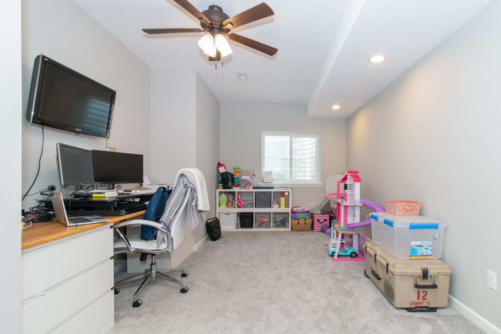 1767 Beech Street Normal, IL 61761 - Photo 44 of 55 a view of a workspace with furniture and a flat screen tv