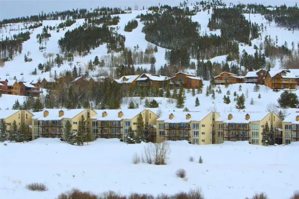 a view of a swimming pool with a lounge chairs