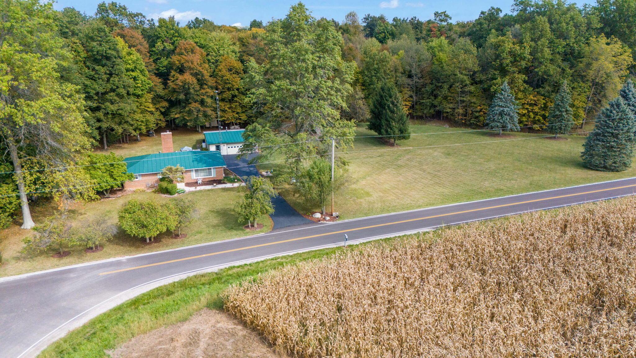6073 Wickham Road Sycamore, OH 44882 - Photo 7 of 55 9-web-or-mls-DJI_20240925114207_0235_D