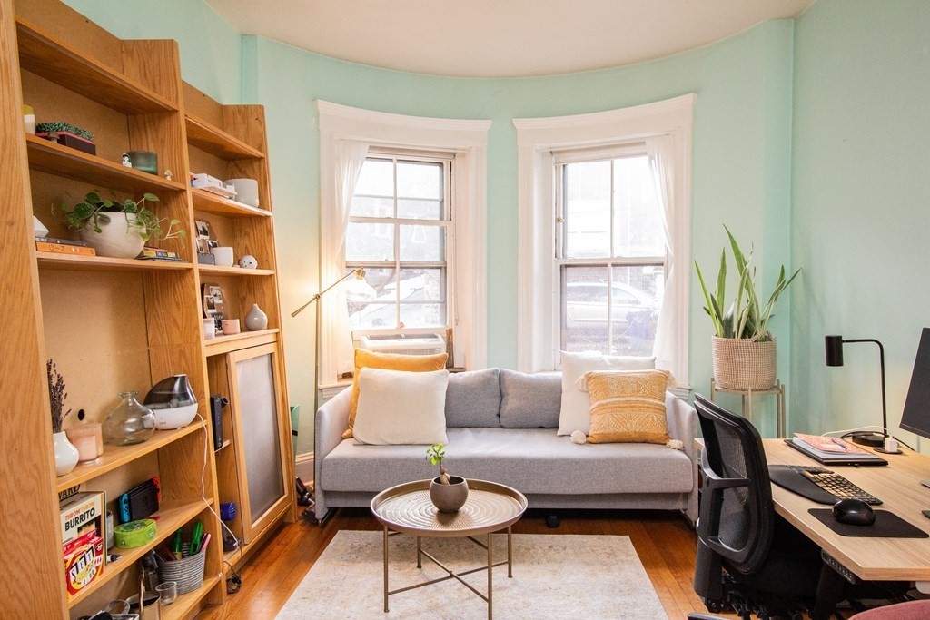 34 Winchester Street, Unit 2 Brookline, MA 02446 - Photo 1 of 14 a living room with furniture and a window