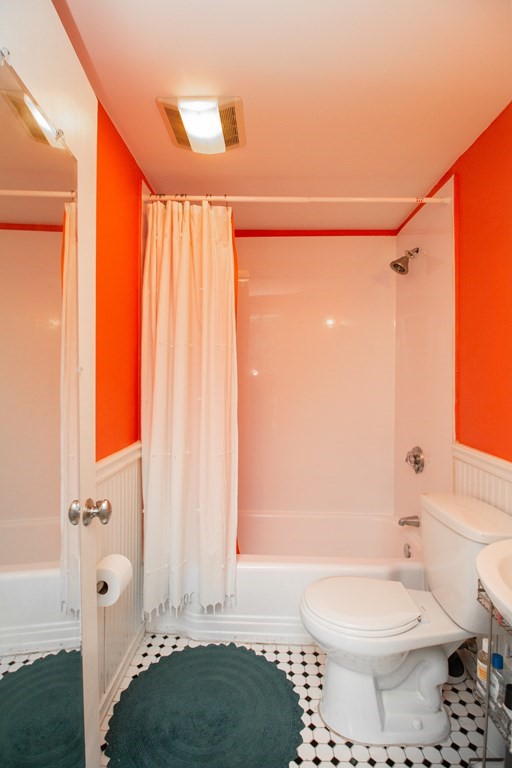 34 Winchester Street, Unit 2 Brookline, MA 02446 - Photo 13 of 14 a bathroom with a sink a toilet and shower