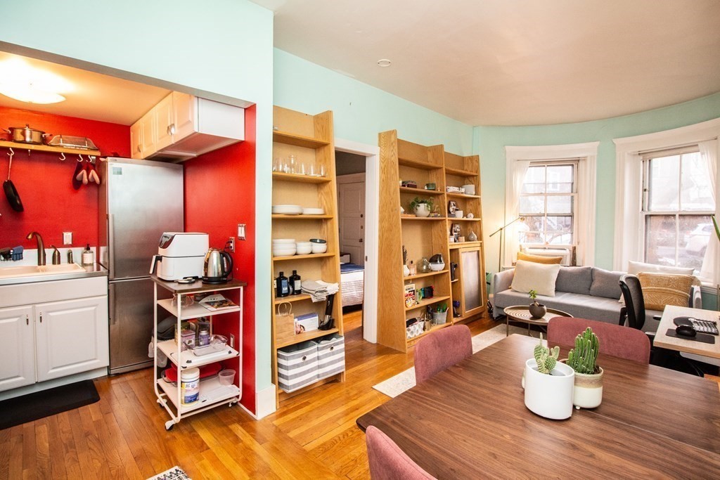 34 Winchester Street, Unit 2 Brookline, MA 02446 - Photo 5 of 14 a room with furniture or couch and a window