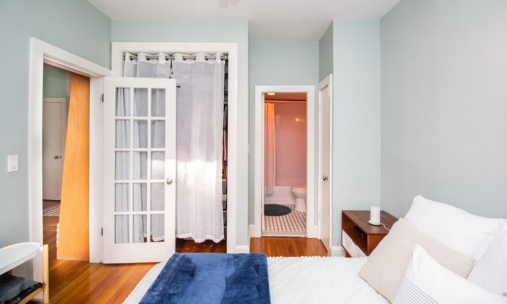 34 Winchester Street, Unit 2 Brookline, MA 02446 - Photo 8 of 14 a living room with furniture and a window