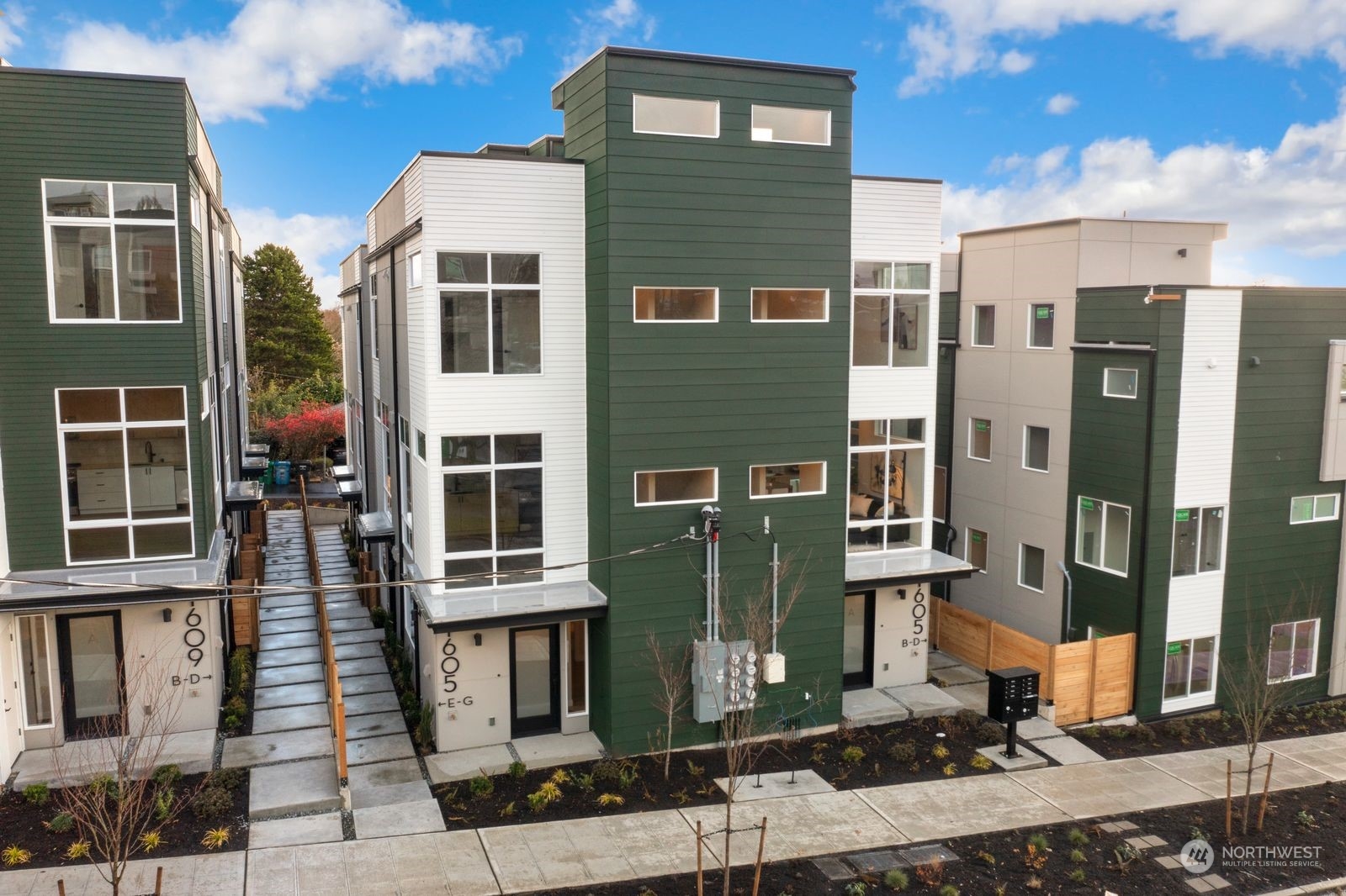 1605 South Washington Street Seattle, WA 98144 - Photo 14 of 17 a front view of a house with a yard