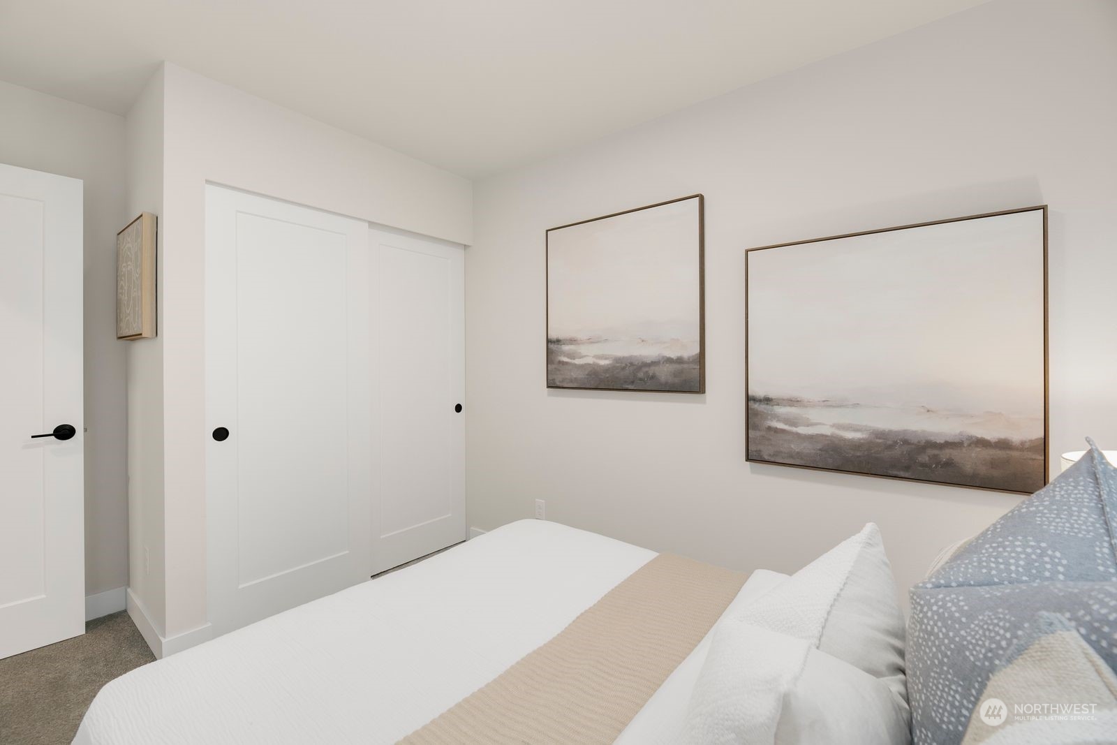 1605 South Washington Street Seattle, WA 98144 - Photo 10 of 17 a bedroom with a bed and a painting on the wall