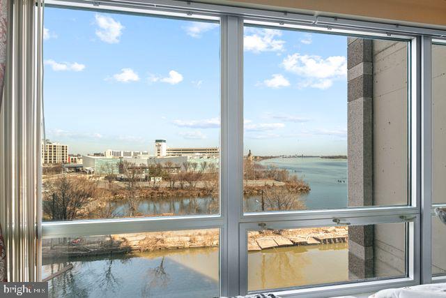901 North Penn Street, Unit R507 Philadelphia, PA 19123 - Photo 6 of 28 a view of a glass door with a floor to ceiling windows