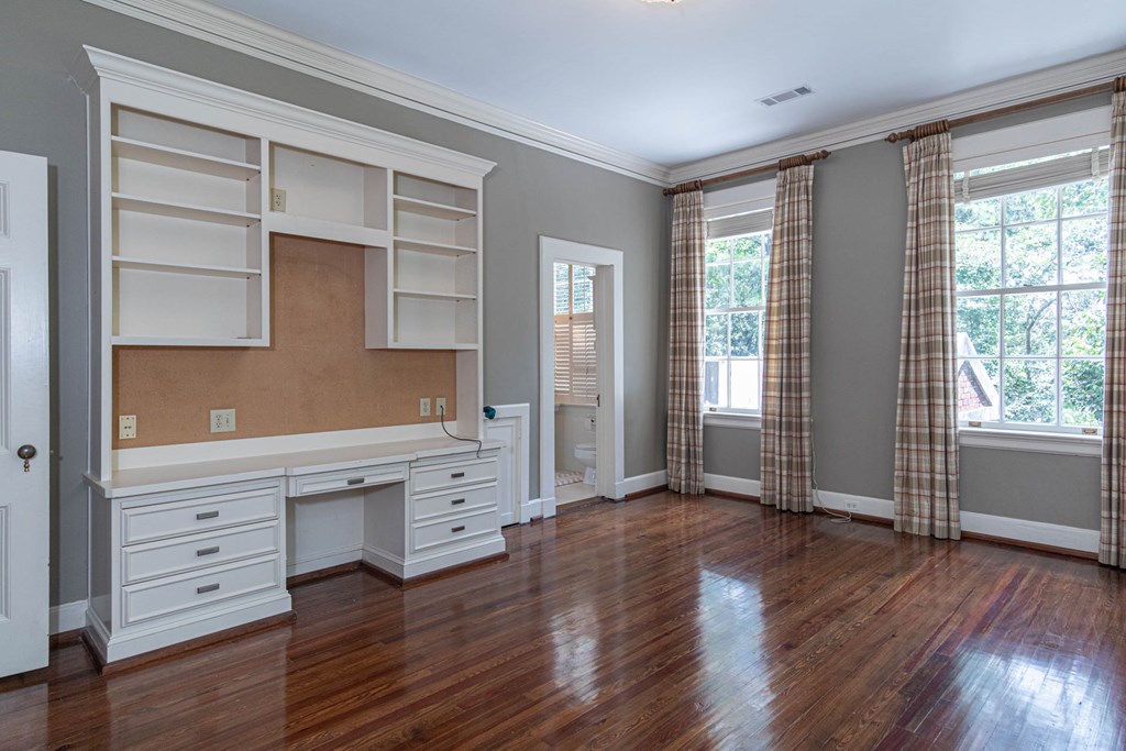 1617 Summit Drive Columbus, GA 31906 - Photo 22 of 35 an empty room with cabinet and windows