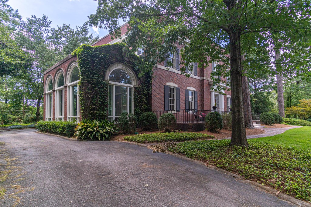 1617 Summit Drive Columbus, GA 31906 - Photo 25 of 35 a front view of a house with garden