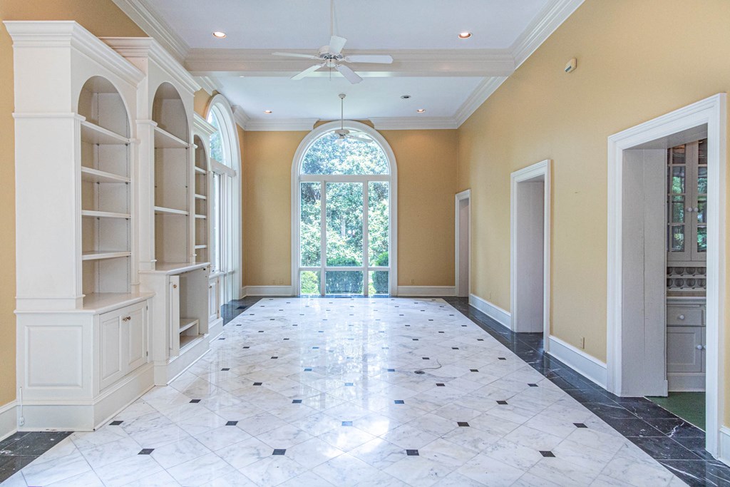 1617 Summit Drive Columbus, GA 31906 - Photo 3 of 35 wooden floor in an empty room with a window