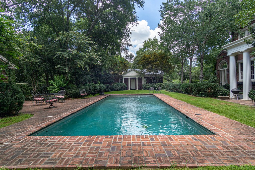 1617 Summit Drive Columbus, GA 31906 - Photo 32 of 35 a view of a swimming pool with a yard