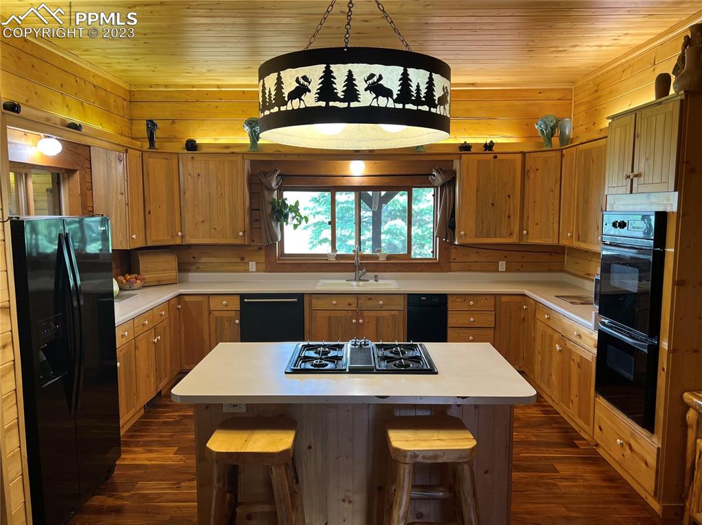 87 Thompson Road Gardner, CO 81040 - Photo 18 of 49 a kitchen with a stove a refrigerator and a stove