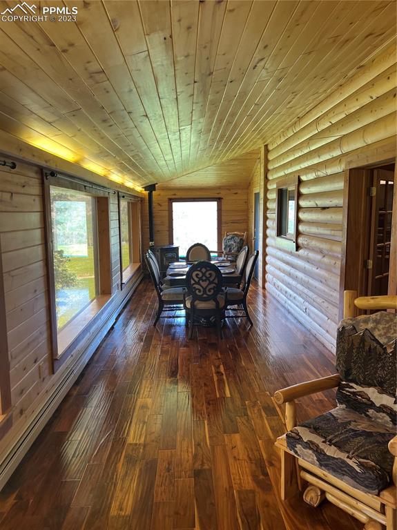 87 Thompson Road Gardner, CO 81040 - Photo 23 of 49 a dining room with furniture and wooden floor