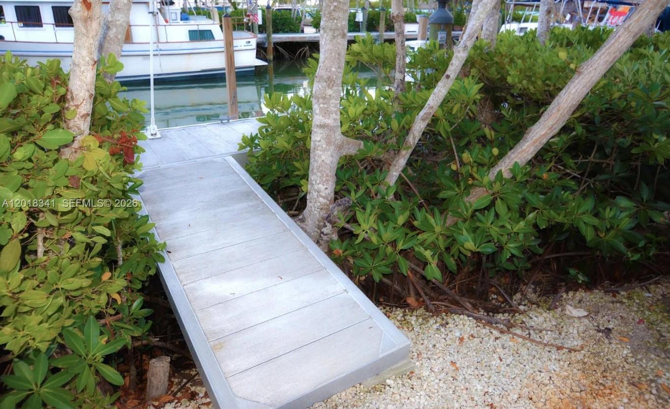 100 Morris Lane Key Largo, FL 33037 - Photo 5 of 10 a view of backyard with potted plants