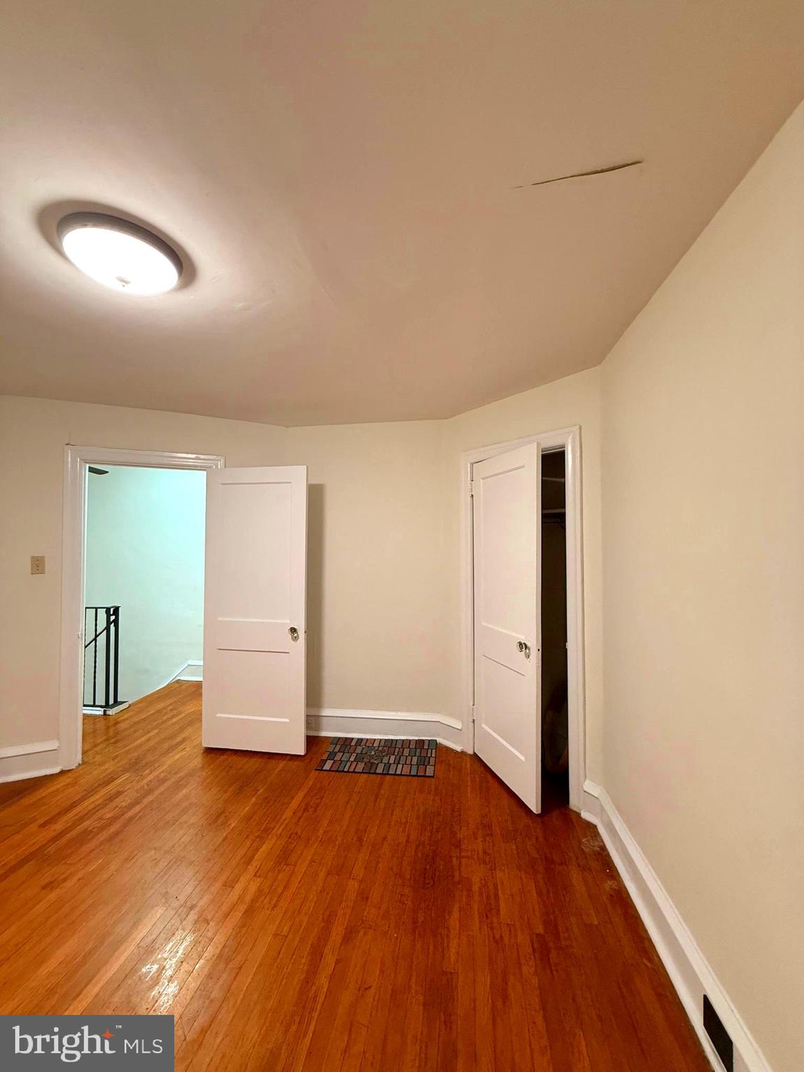 5118 Oakland Street, Unit 2 Philadelphia, PA 19124 - Photo 11 of 36 wooden floor in an empty room