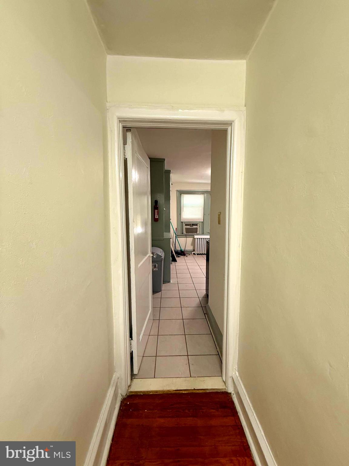 5118 Oakland Street, Unit 2 Philadelphia, PA 19124 - Photo 16 of 36 a view of a hallway view with wooden floor and a living room