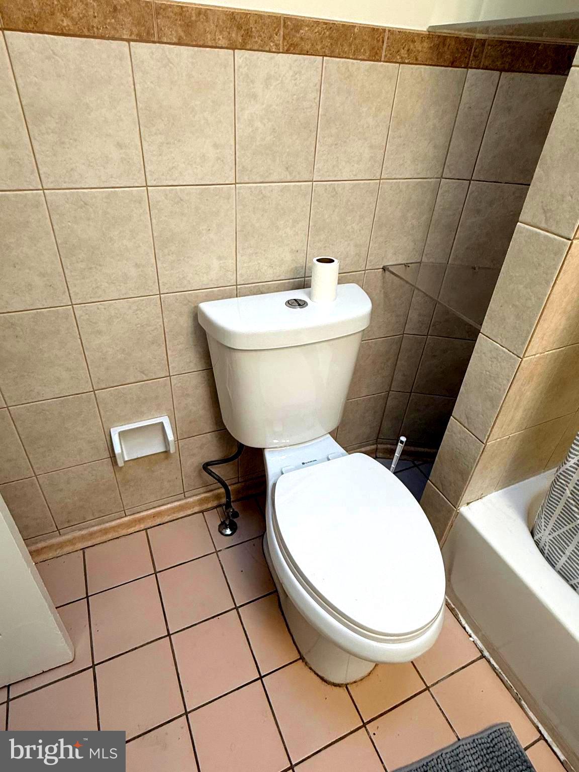5118 Oakland Street, Unit 2 Philadelphia, PA 19124 - Photo 24 of 36 a bathroom with a toilet and a sink