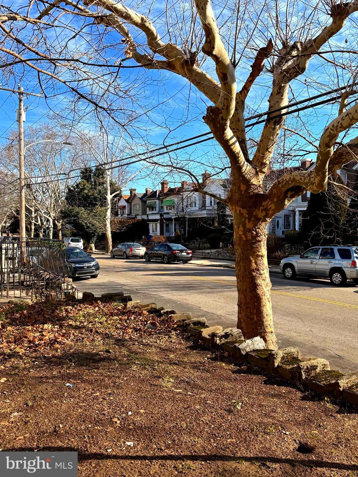 5118 Oakland Street, Unit 2 Philadelphia, PA 19124 - Photo 35 of 36 a street view with tall buildings