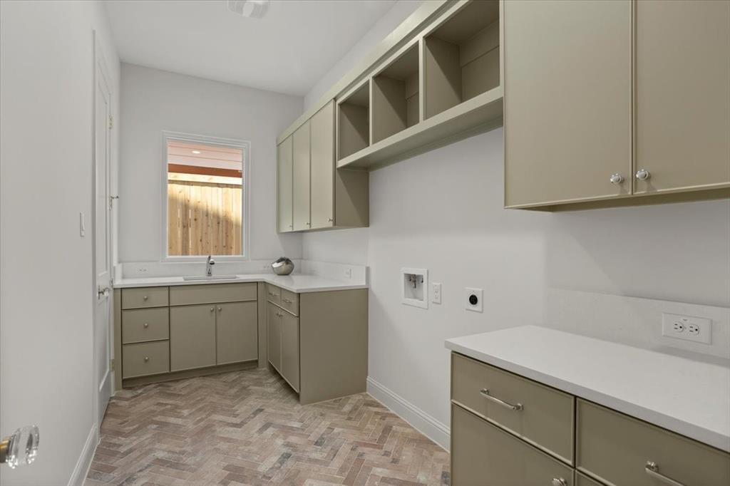 3935 Rochelle Drive Dallas, TX 75220 - Photo 18 of 27 a room with a sink cabinets and utility room