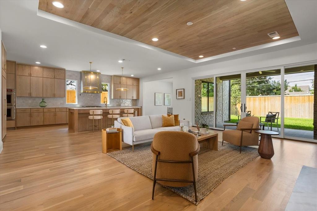 3935 Rochelle Drive Dallas, TX 75220 - Photo 9 of 27 a living room with furniture and a large window