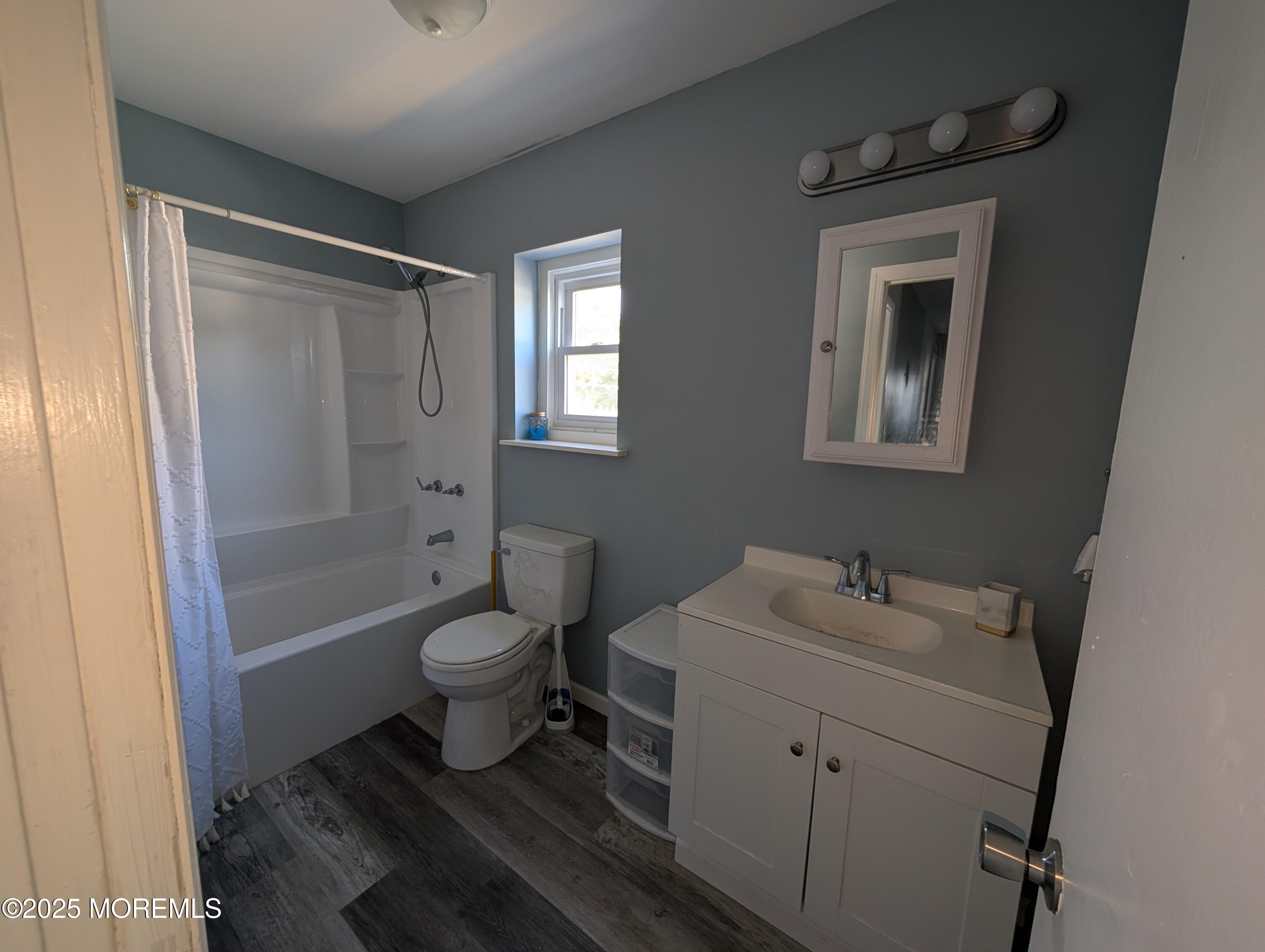164 Port Monmouth Road, Unit B Keansburg, NJ 07734 - Photo 13 of 17 a bathroom with a sink toilet and shower