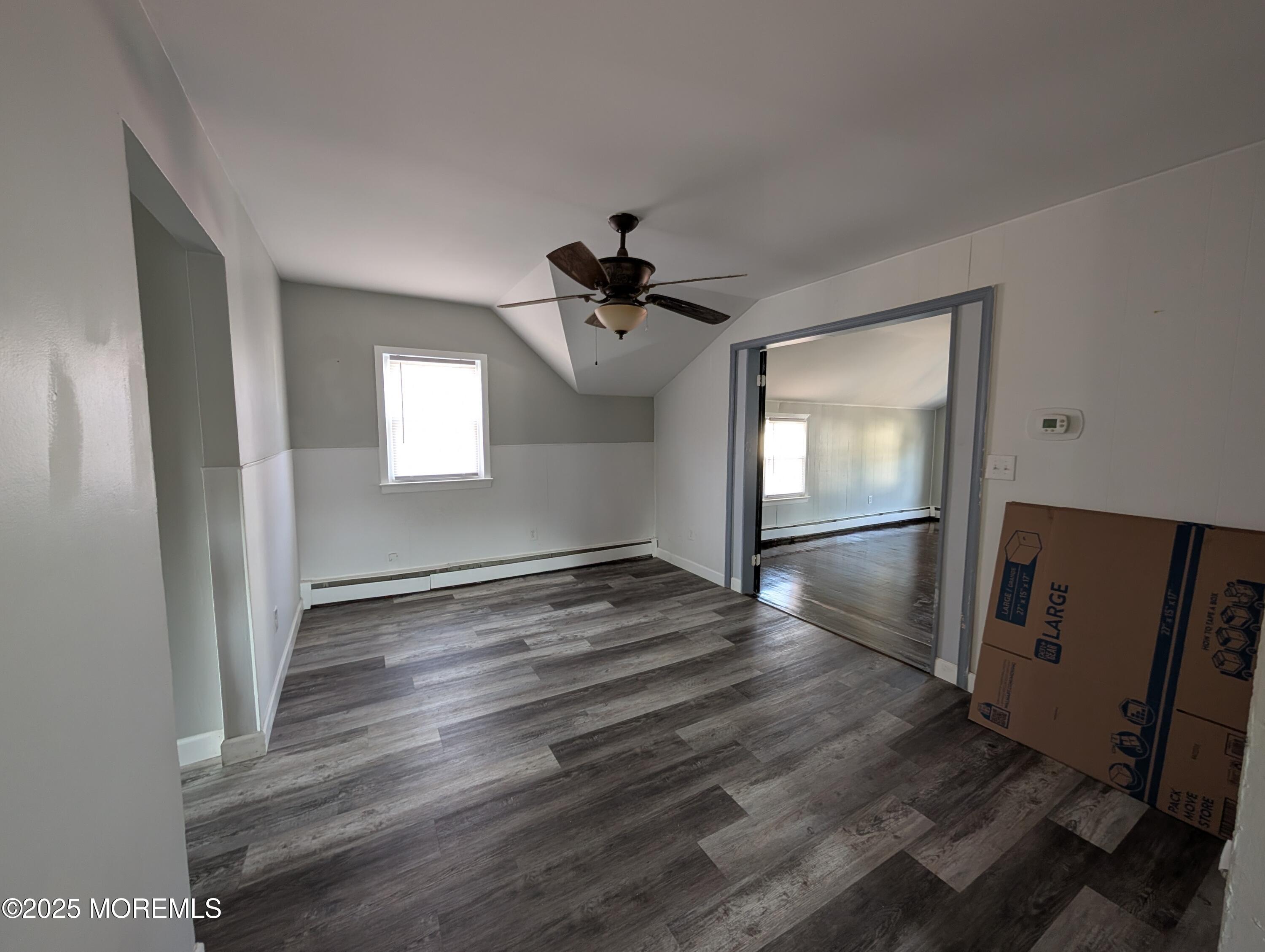 164 Port Monmouth Road, Unit B Keansburg, NJ 07734 - Photo 5 of 17 wooden floor in an empty room with a window