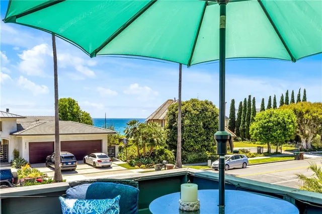 a view of yard with patio