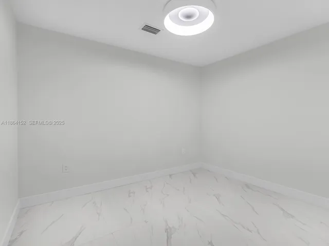 a view of a swimming pool with a bench and a lake view