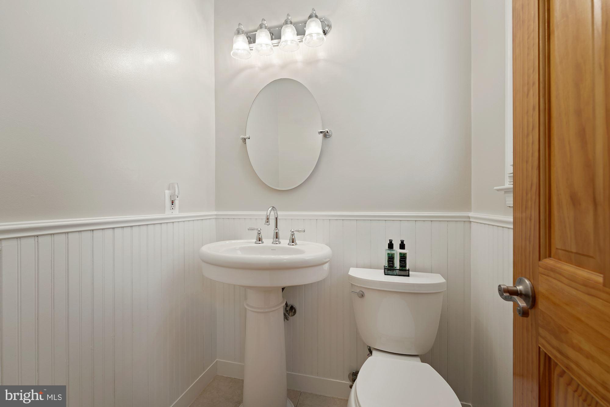1106 K Street Northeast Washington, DC 20002 - Photo 10 of 26 Discreet powder room behind kitchen