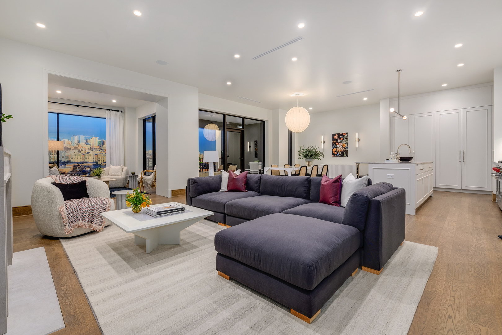 21 North May Street, Unit 404 Chicago, IL 60607 - Photo 12 of 25 a living room with furniture and wooden floor