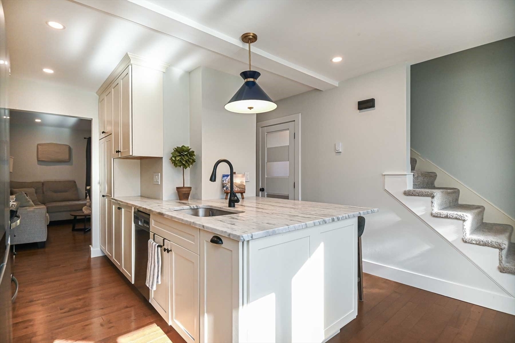 1 Acadia Kimball Road, Unit 1 Amesbury, MA 01913 - Photo 3 of 21 a kitchen with sink stove and refrigerator