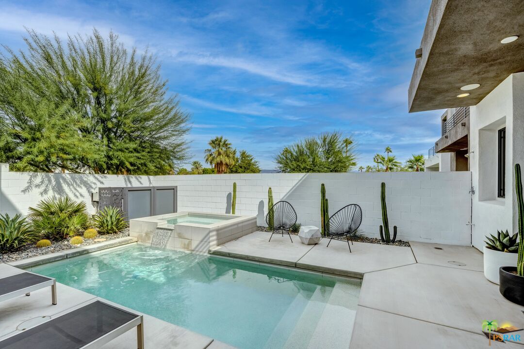 504 Paragon Loop Palm Springs, CA 92262 - Photo 14 of 45 a view of a table and chairs in patio
