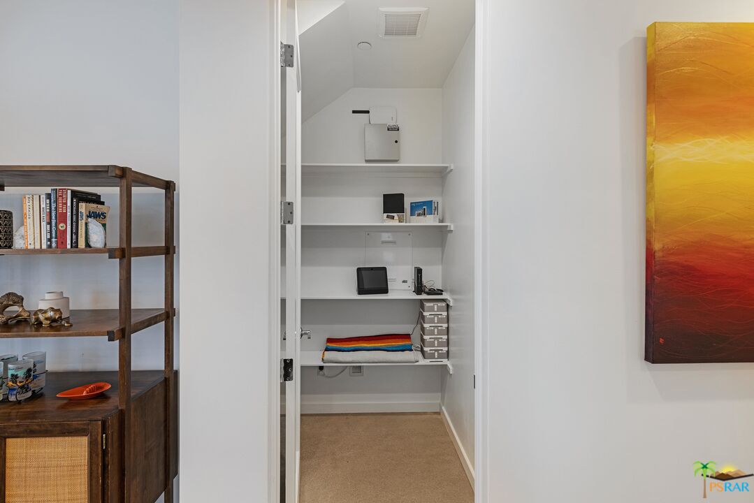 504 Paragon Loop Palm Springs, CA 92262 - Photo 20 of 45 a room with storage and utility