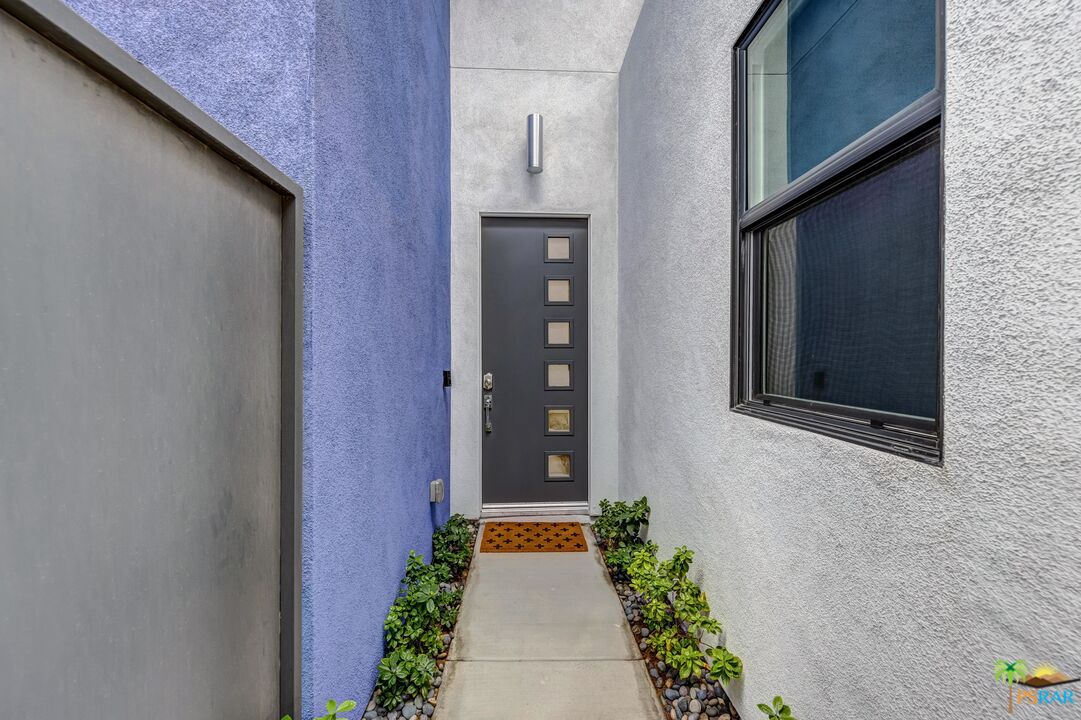 504 Paragon Loop Palm Springs, CA 92262 - Photo 4 of 45 a front view of a house