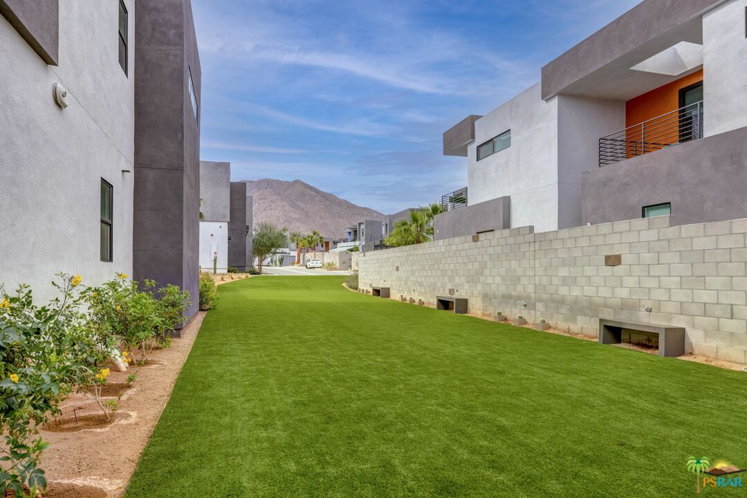 504 Paragon Loop Palm Springs, CA 92262 - Photo 43 of 45 a view of a patio with a yard