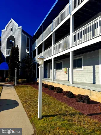 a front view of a house with swimming pool