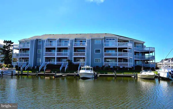 a view of house with swimming pool