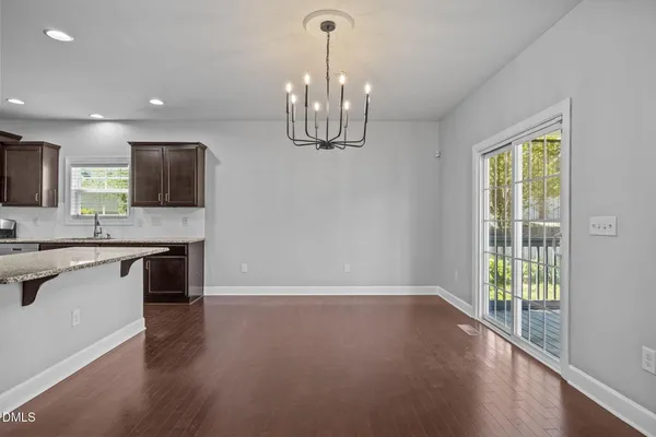a living room with furniture fireplace and a flat screen tv