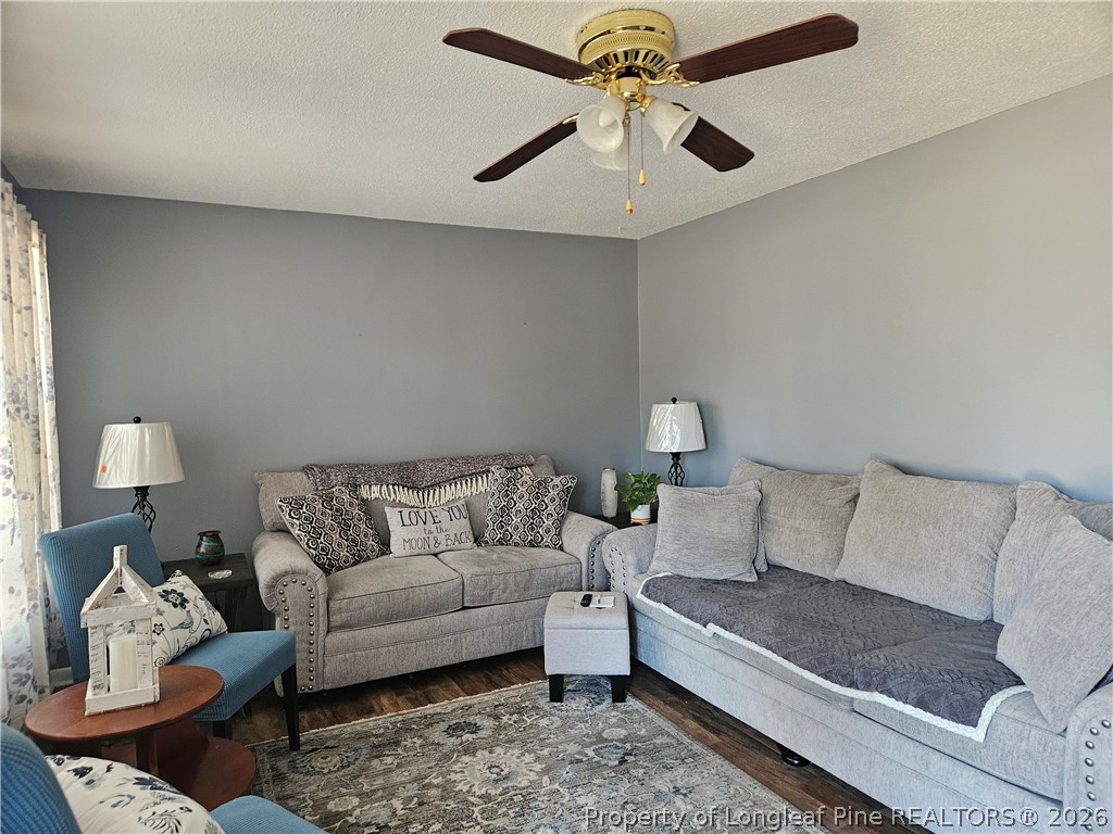 4547 Legion Road Hope Mills, NC 28348 - Photo 3 of 28 a living room with furniture and a couch