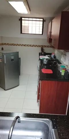 a bathroom with a tub and mirror