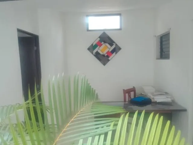 a bathroom with a toilet and a sink