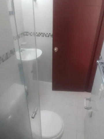 a view of a glass door and the balcony