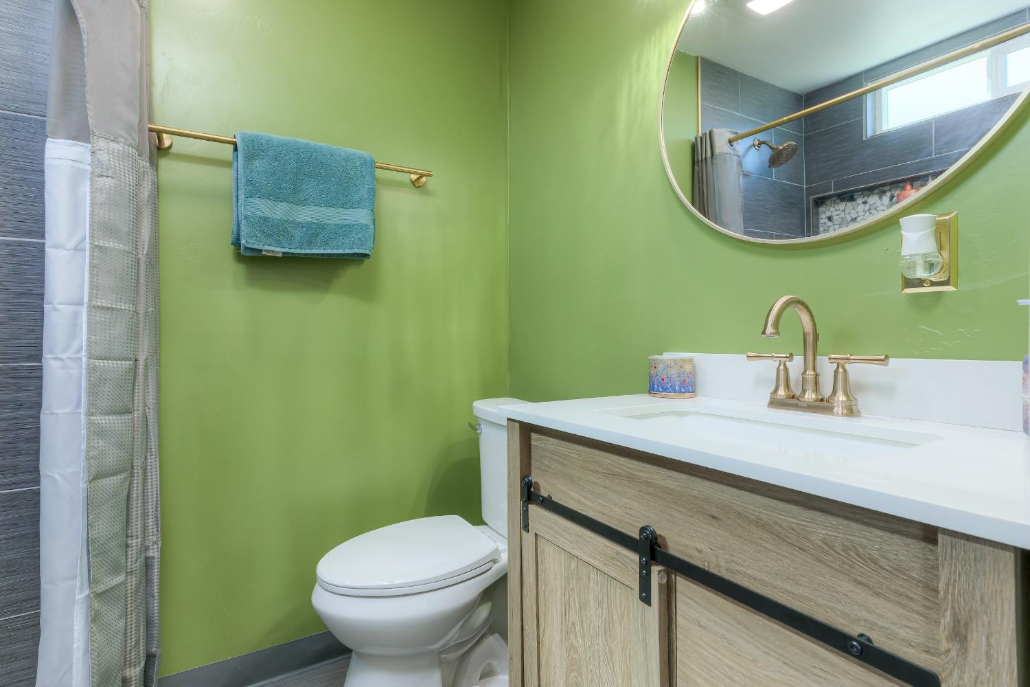 2633 Oroville Garden Ranch Road Oroville, CA 95966 - Photo 8 of 22 a bathroom with a granite countertop toilet sink and mirror