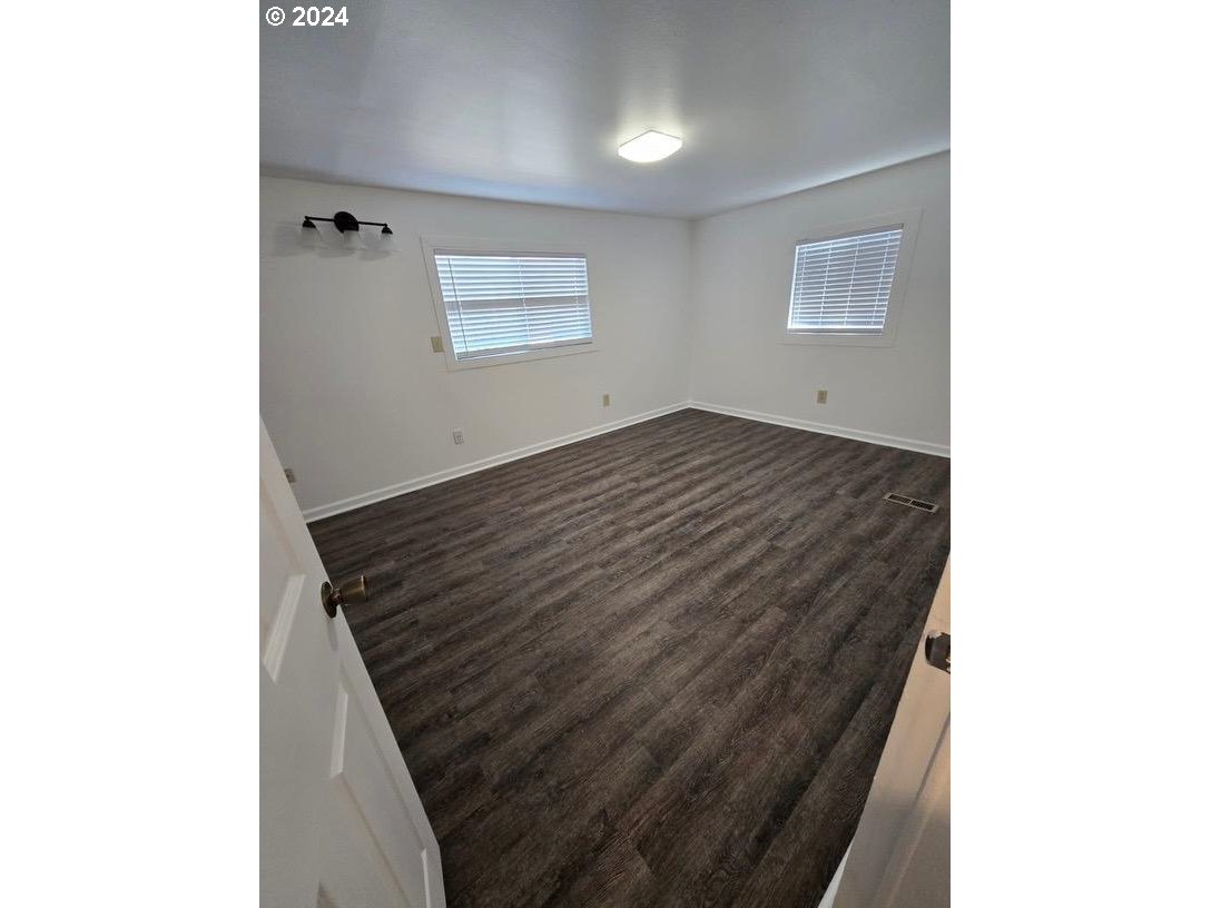 12450 Southwest Fischer Road, Unit 143 Portland, OR 97224 - Photo 9 of 11 a view of a hallway