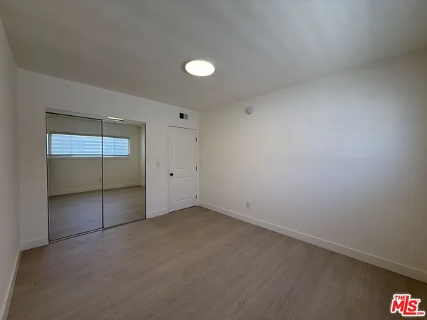 a view of a small space with a window