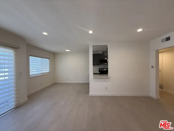 an empty room with closet