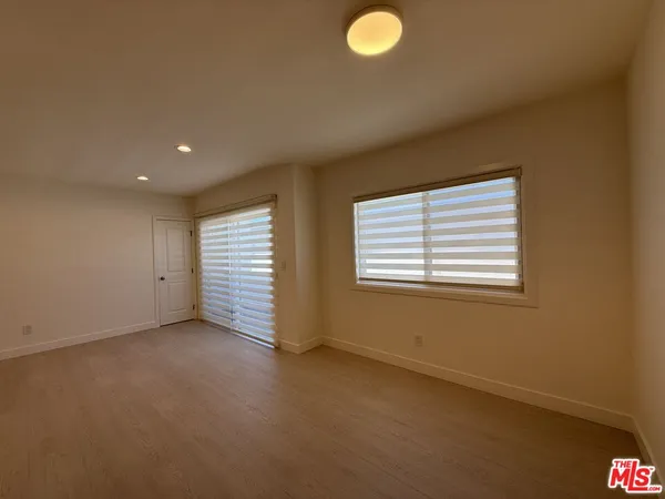 an empty room with a workspace