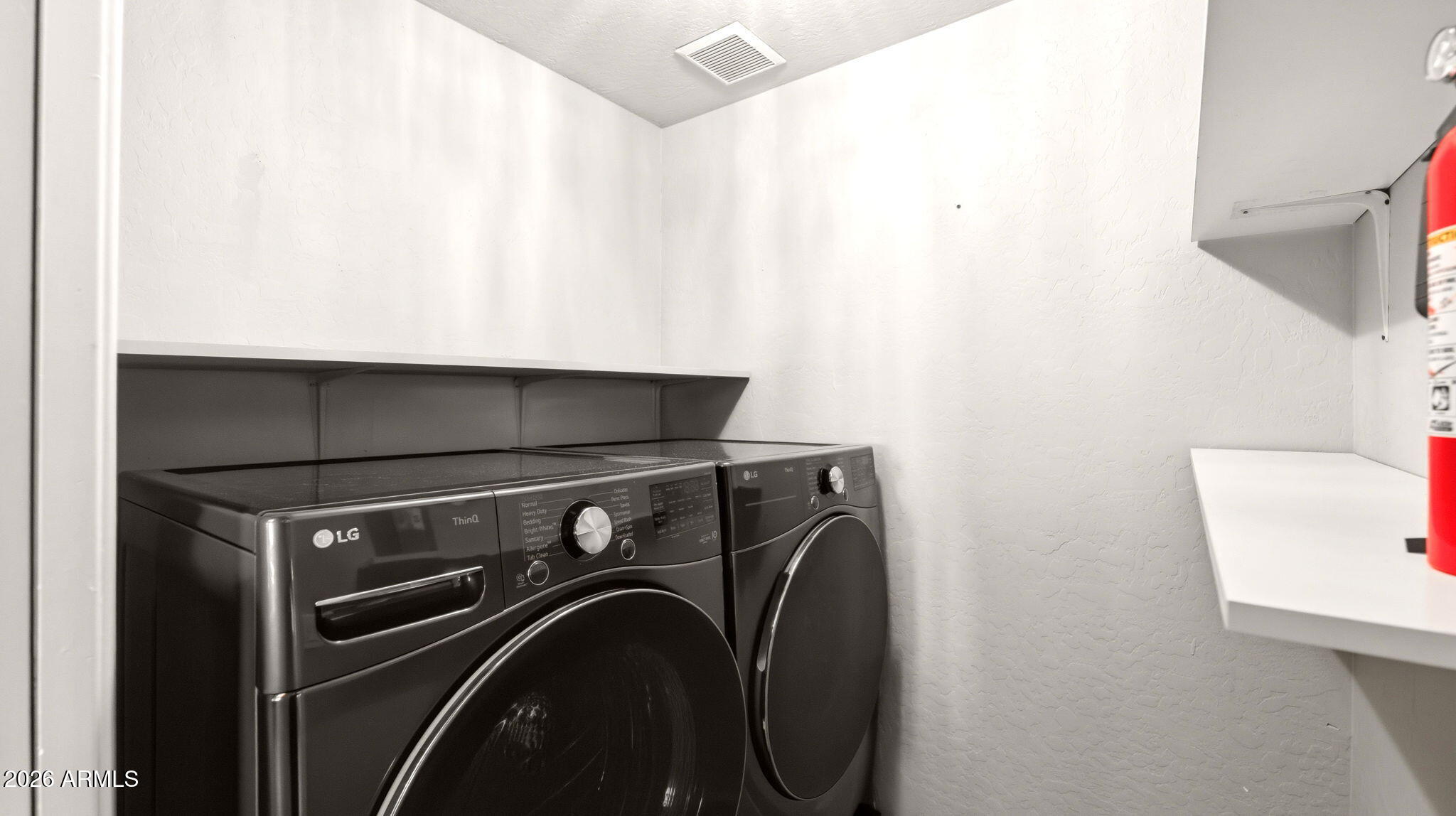 9065 East Gary Road, Unit 126 Scottsdale, AZ 85260 - Photo 13 of 37 a utility room with dryer and washer