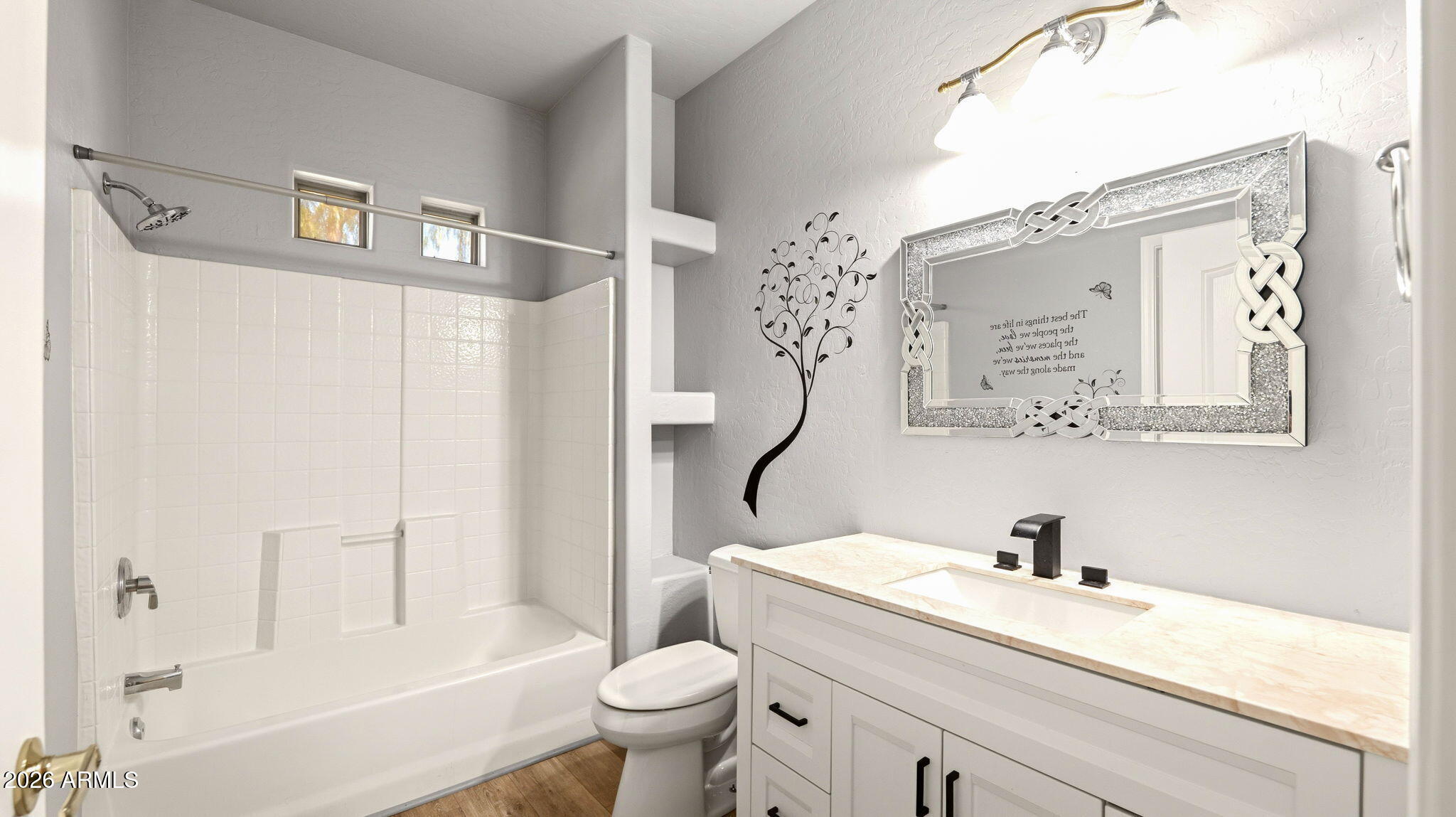 9065 East Gary Road, Unit 126 Scottsdale, AZ 85260 - Photo 23 of 37 a bathroom with a sink a toilet and shower